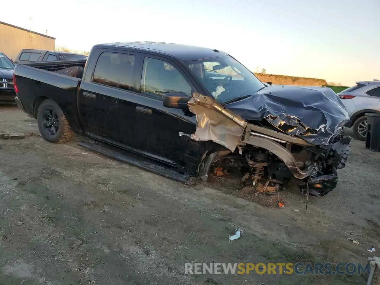 4 Photograph of a damaged car 3C6RR7KGXPG647843 RAM 1500 2023