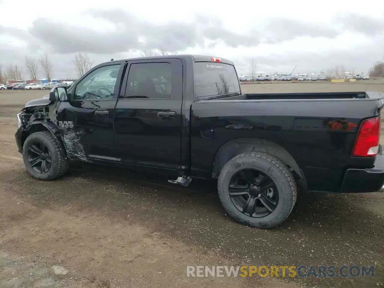 2 Photograph of a damaged car 3C6RR7KT2PG669929 RAM 1500 2023