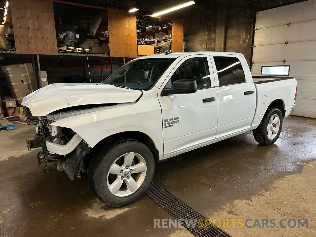 1 Photograph of a damaged car 3C6RR7LG4PG678827 RAM 1500 2023