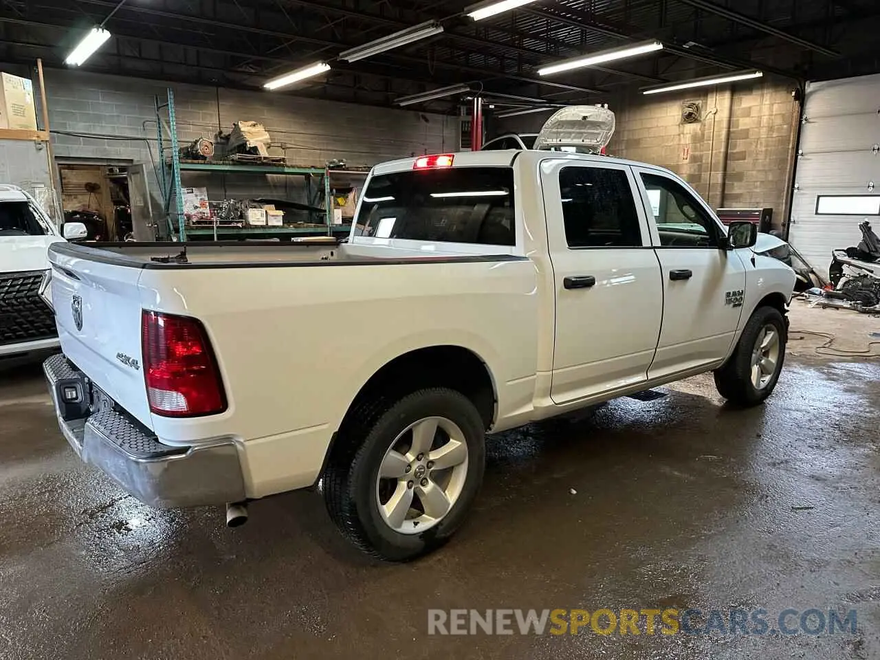 3 Photograph of a damaged car 3C6RR7LG4PG678827 RAM 1500 2023