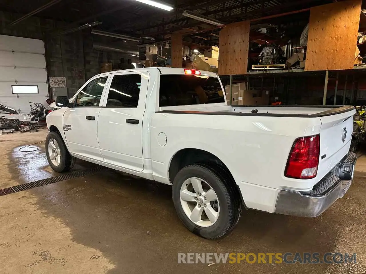 4 Photograph of a damaged car 3C6RR7LG4PG678827 RAM 1500 2023