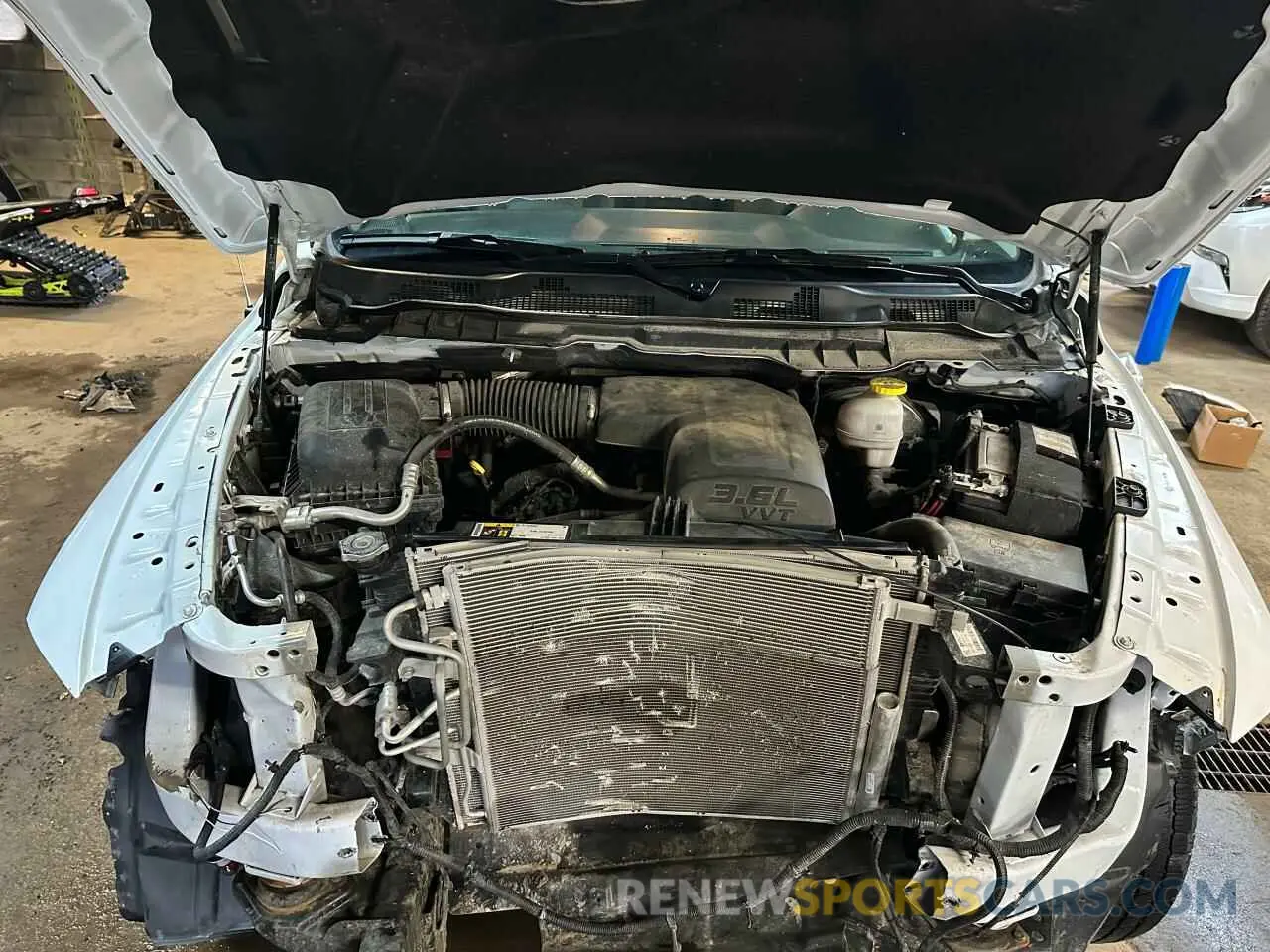5 Photograph of a damaged car 3C6RR7LG4PG678827 RAM 1500 2023