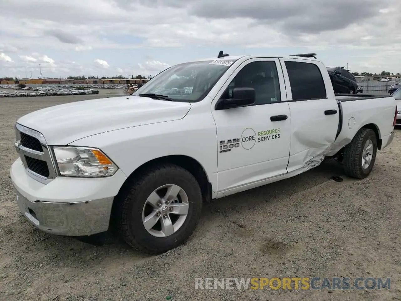 1 Photograph of a damaged car 3C6RR7LG8PG661075 RAM 1500 2023