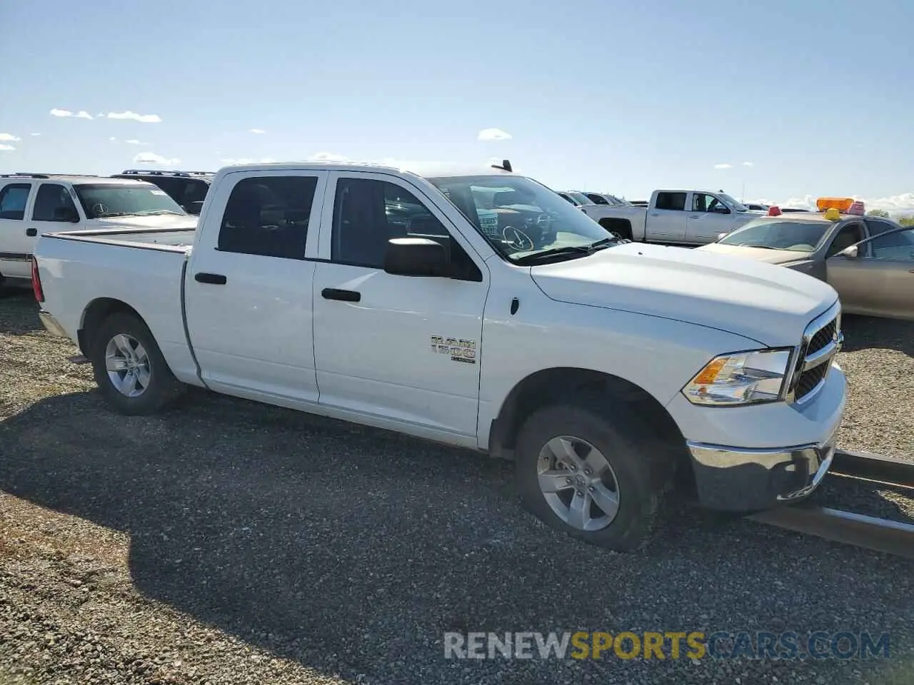 4 Photograph of a damaged car 3C6RR7LG8PG661075 RAM 1500 2023