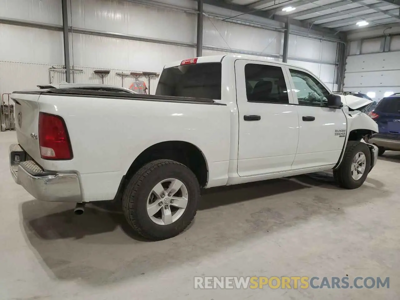 3 Photograph of a damaged car 3C6RR7LG9PG661425 RAM 1500 2023