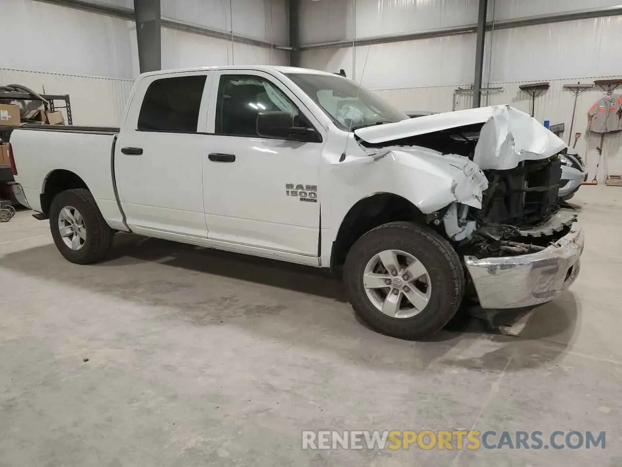 4 Photograph of a damaged car 3C6RR7LG9PG661425 RAM 1500 2023