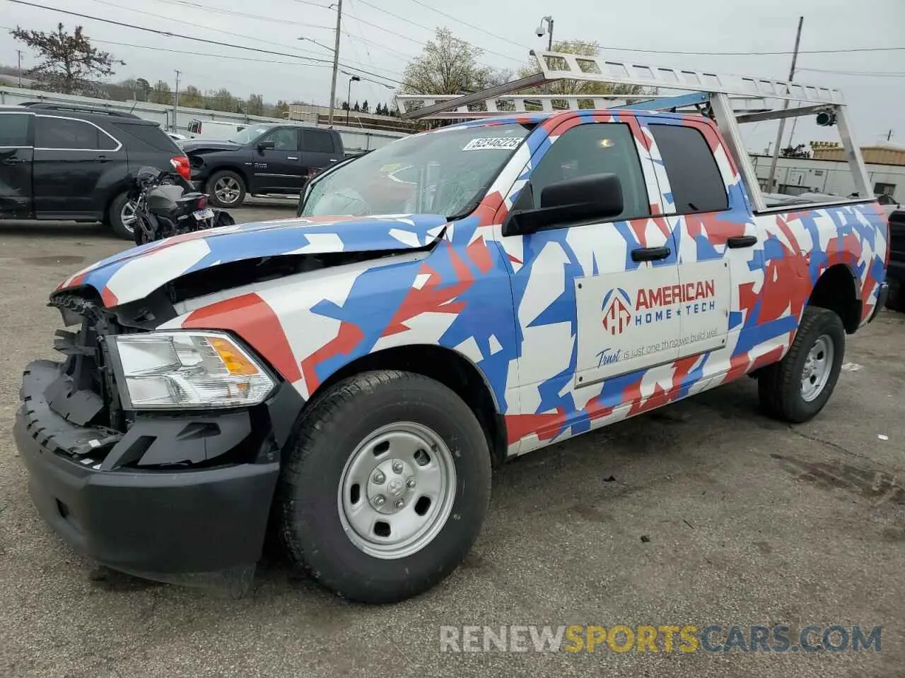 1 Photograph of a damaged car 1C6RR6FGXRS138030 RAM 1500 2024