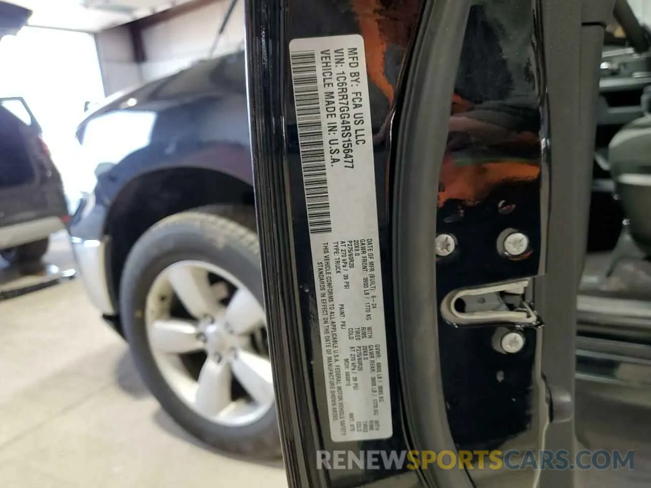12 Photograph of a damaged car 1C6RR7GG4RS156477 RAM 1500 2024