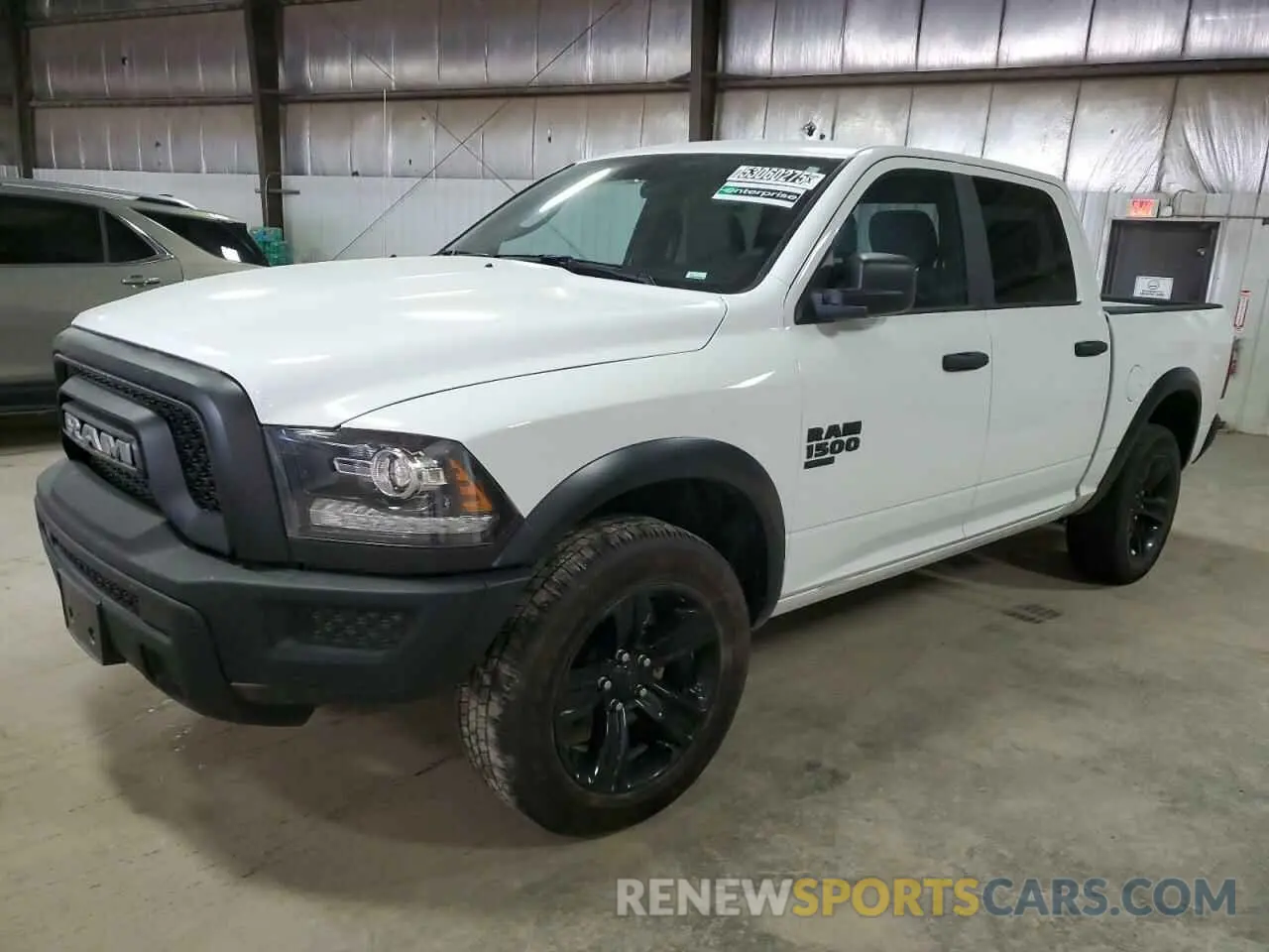 1 Photograph of a damaged car 1C6RR7LG1RS157768 RAM 1500 2024