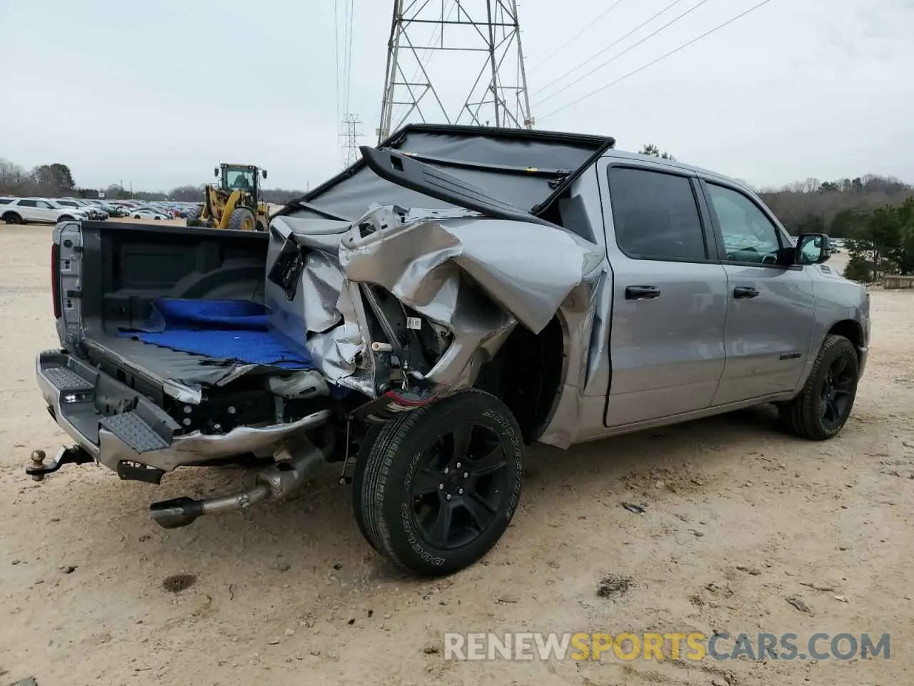 3 Photograph of a damaged car 1C6RREFT1RN122661 RAM 1500 2024