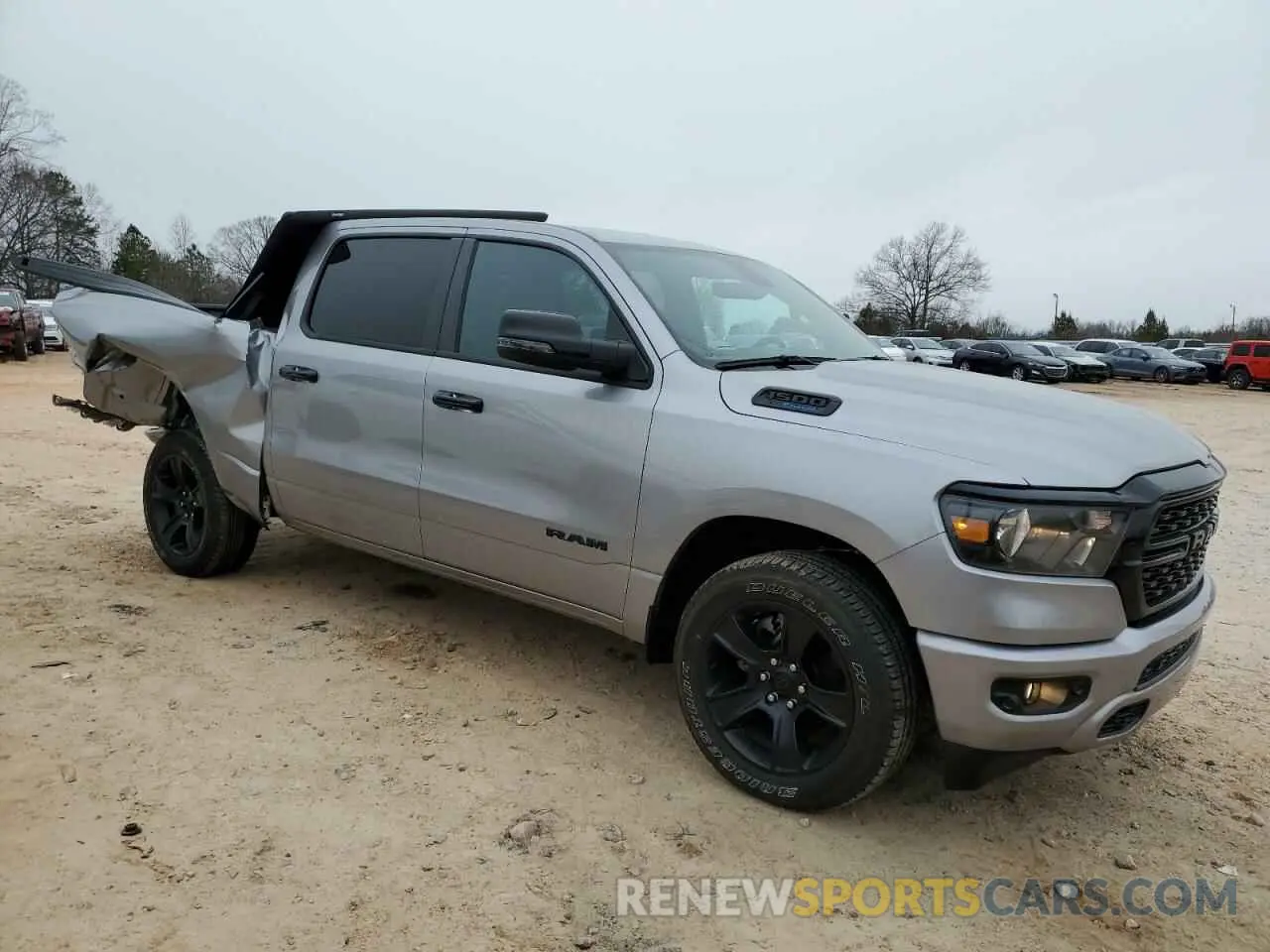 4 Photograph of a damaged car 1C6RREFT1RN122661 RAM 1500 2024