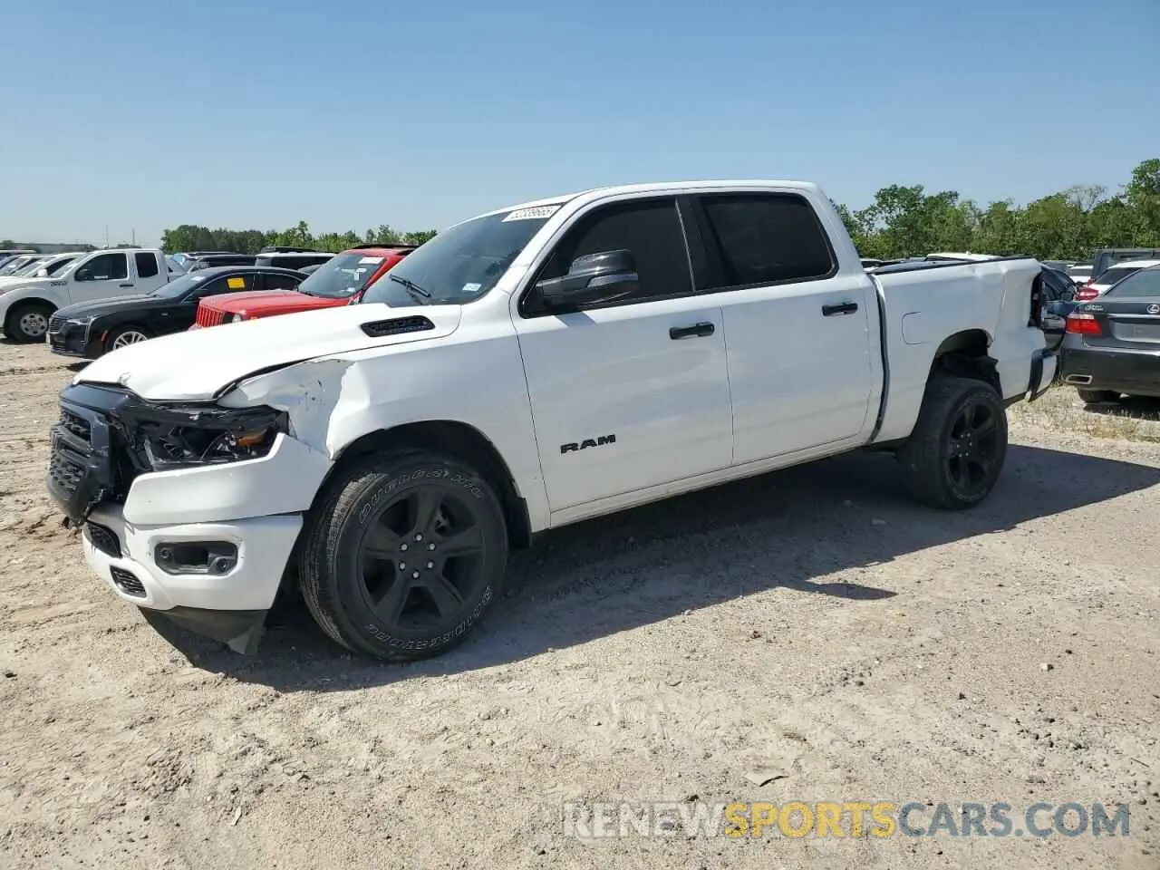 1 Photograph of a damaged car 1C6RREFT1RN146040 RAM 1500 2024