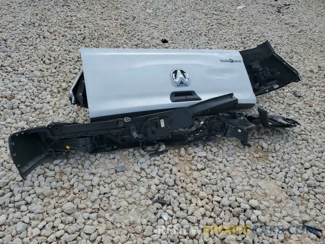12 Photograph of a damaged car 1C6RREFT6RN111834 RAM 1500 2024