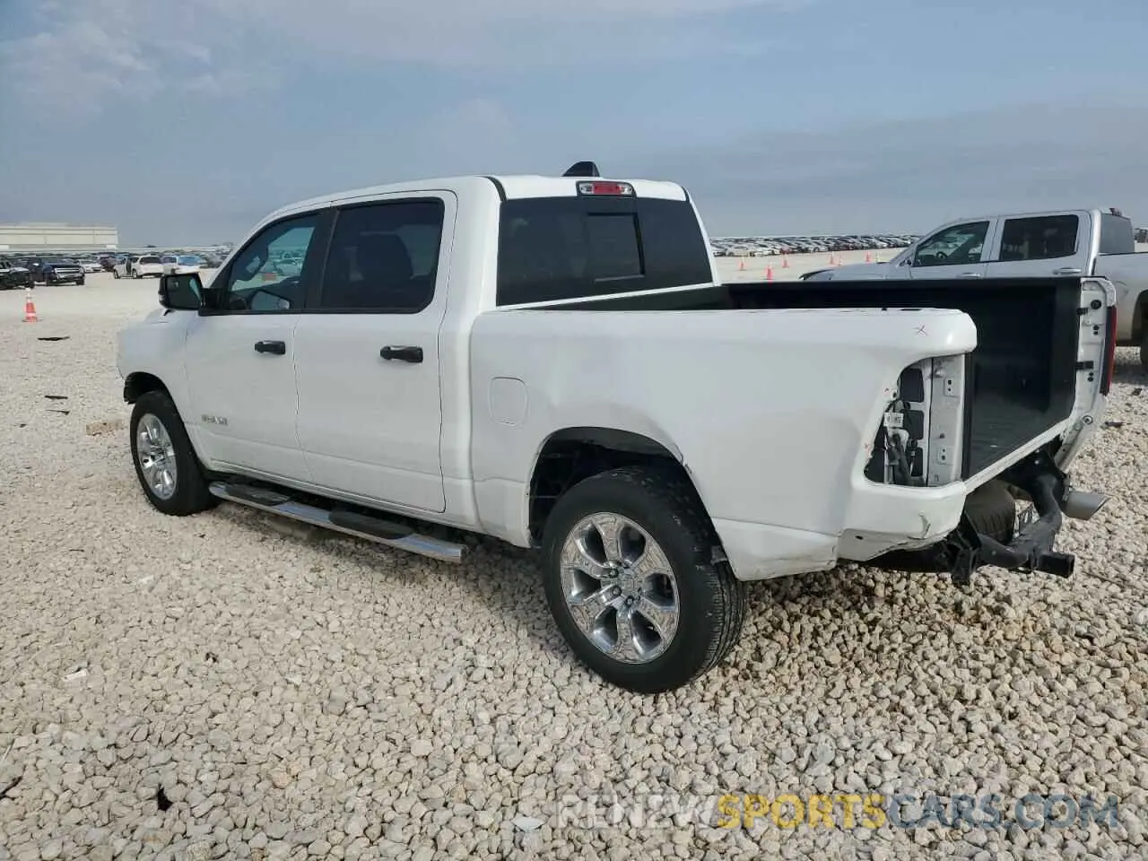 2 Photograph of a damaged car 1C6RREFT6RN111834 RAM 1500 2024