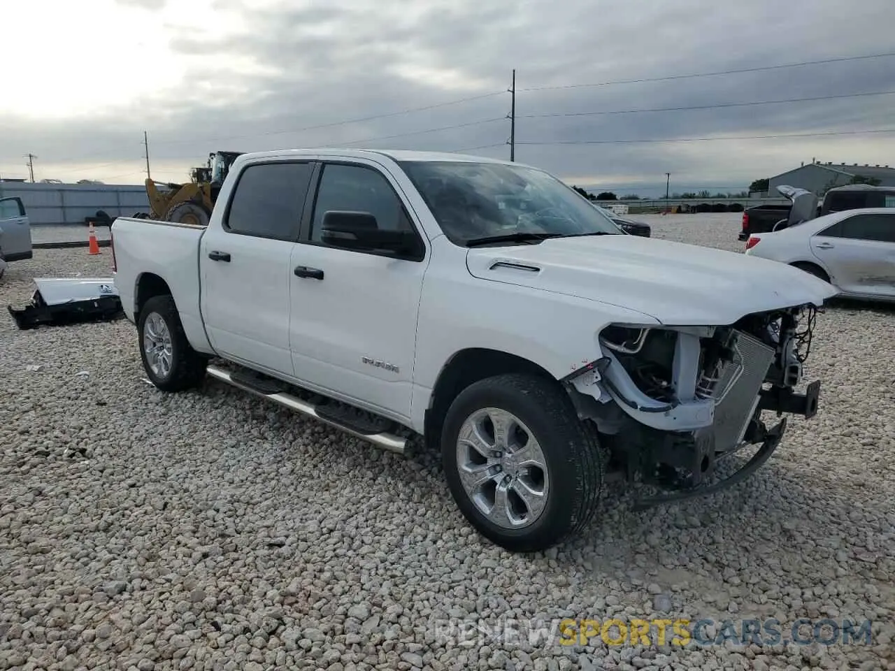4 Photograph of a damaged car 1C6RREFT6RN111834 RAM 1500 2024