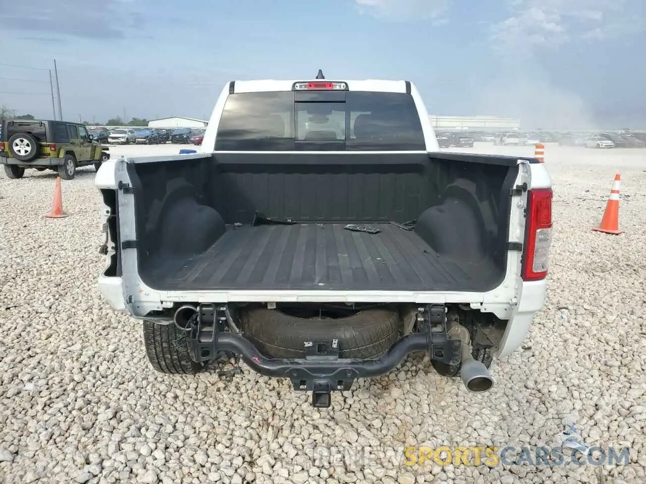 6 Photograph of a damaged car 1C6RREFT6RN111834 RAM 1500 2024