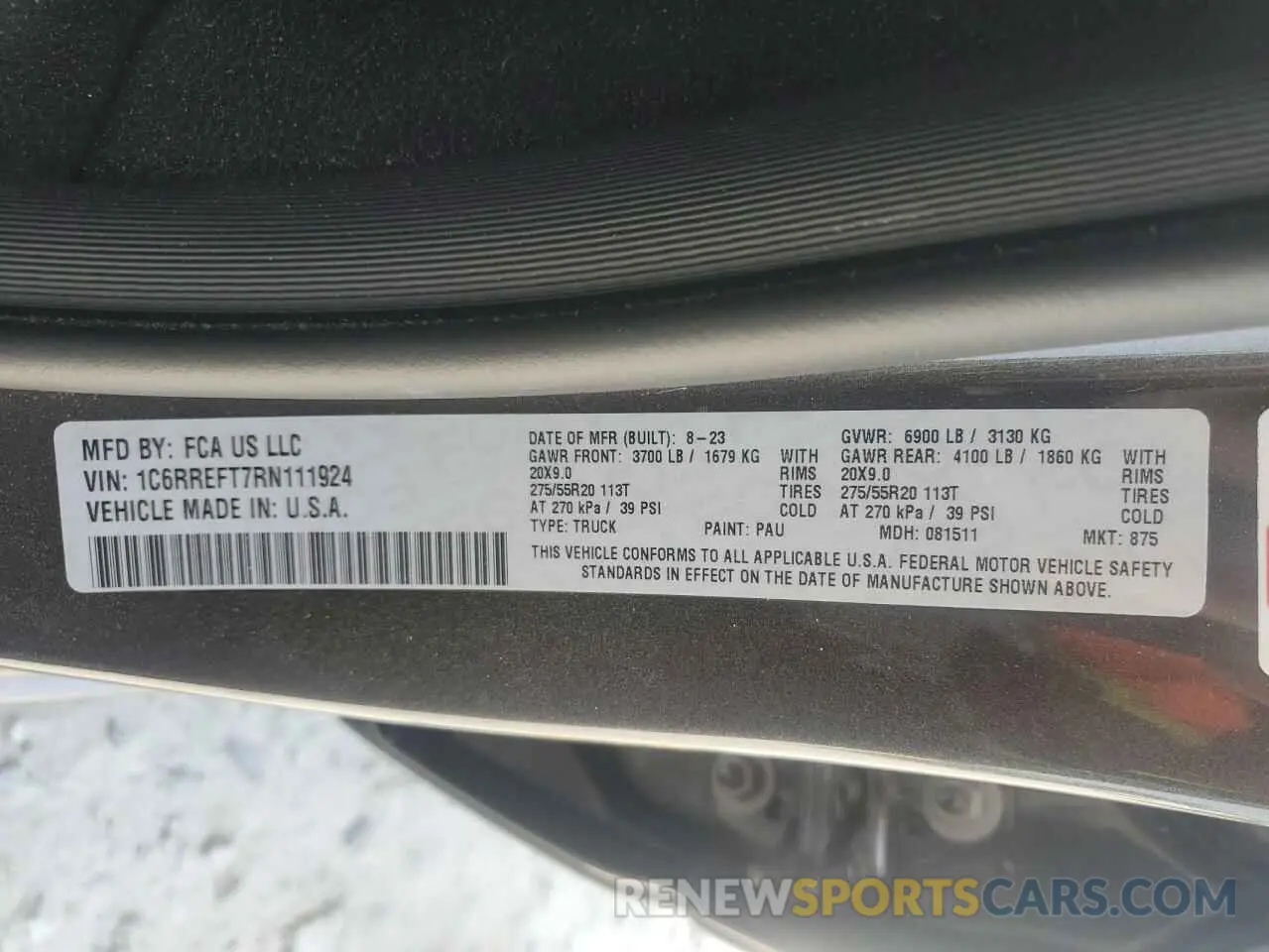 14 Photograph of a damaged car 1C6RREFT7RN111924 RAM 1500 2024
