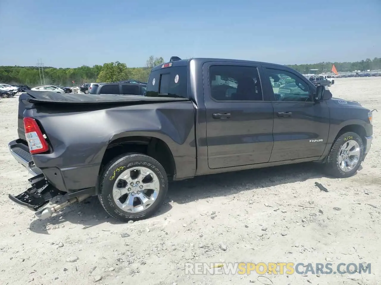 3 Photograph of a damaged car 1C6RREFT7RN111924 RAM 1500 2024