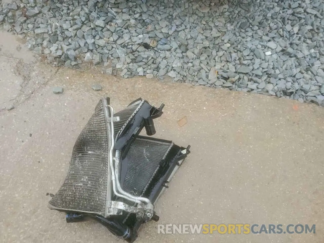 12 Photograph of a damaged car 1C6RREFTXRN151995 RAM 1500 2024