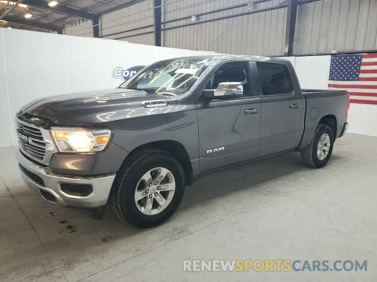 1 Photograph of a damaged car 1C6RREJT0RN220538 RAM 1500 2024