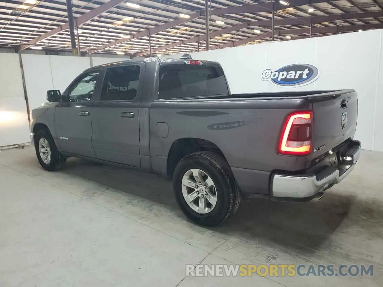 2 Photograph of a damaged car 1C6RREJT0RN220538 RAM 1500 2024