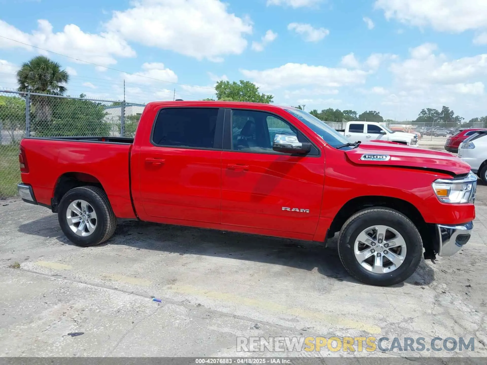 13 Photograph of a damaged car 1C6RREJT3RN219397 RAM 1500 2024