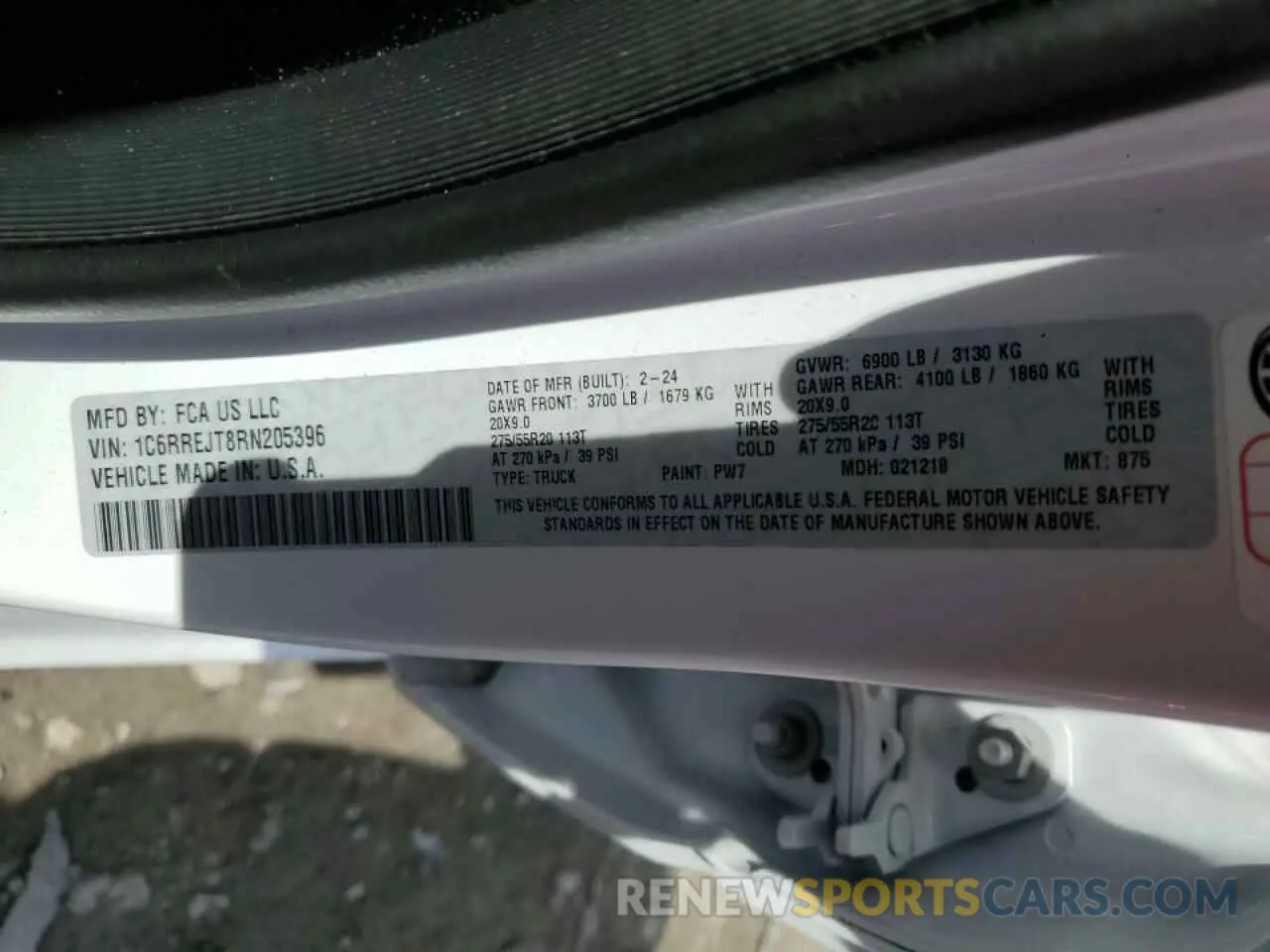 13 Photograph of a damaged car 1C6RREJT8RN205396 RAM 1500 2024