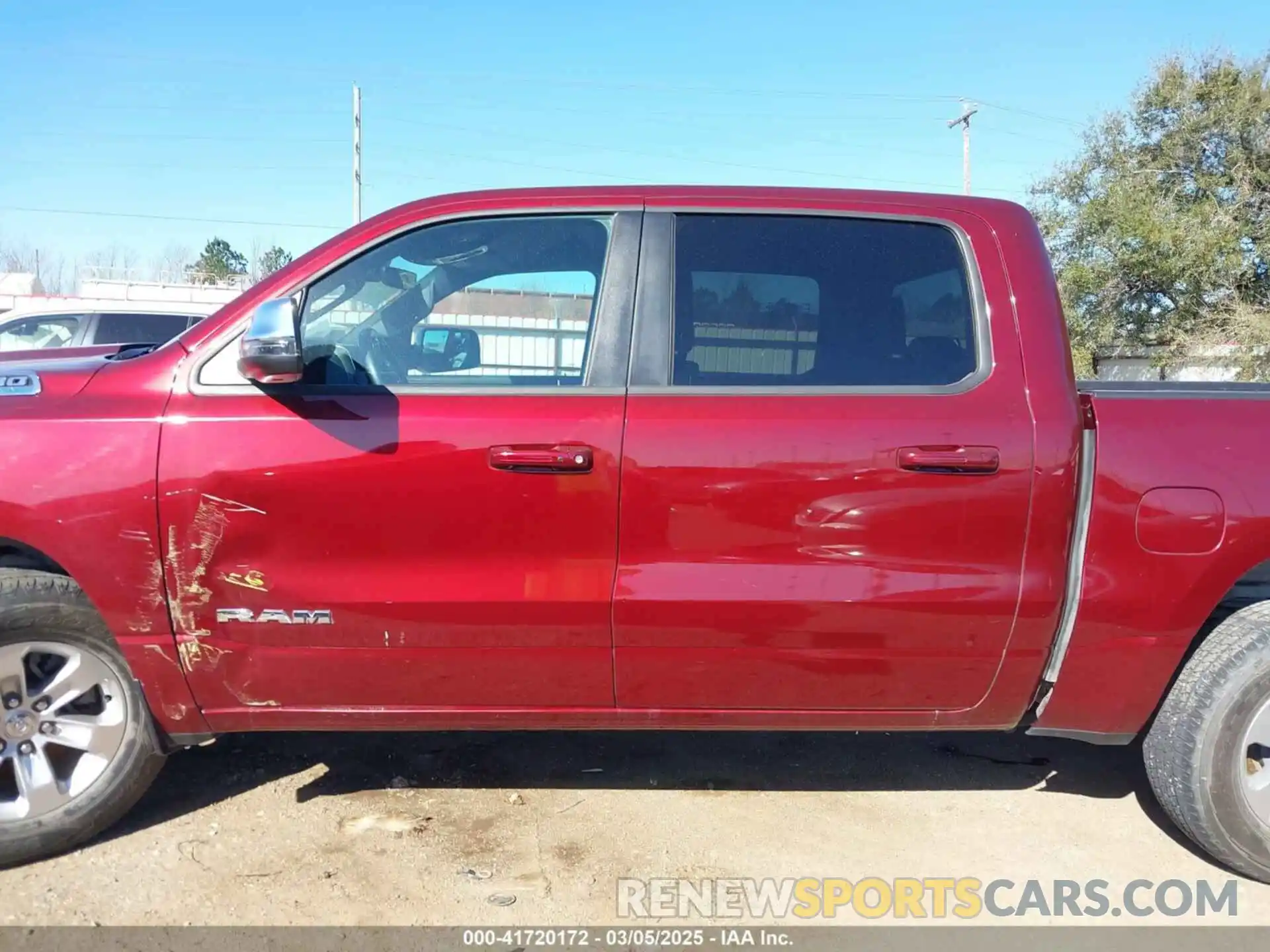 14 Photograph of a damaged car 1C6RREJT8RN220786 RAM 1500 2024