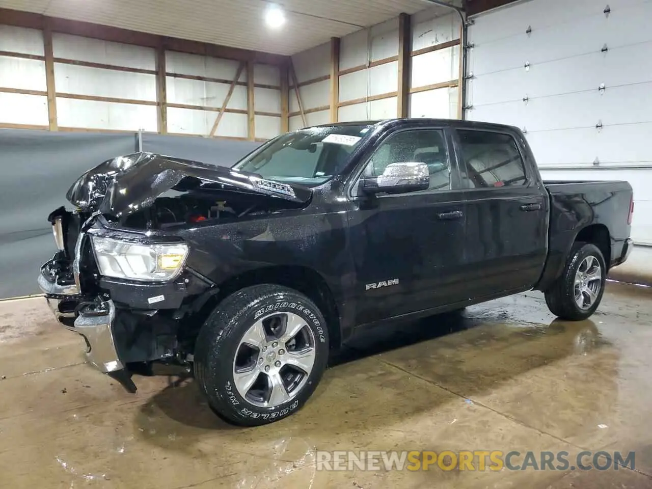 1 Photograph of a damaged car 1C6RREJTXRN218974 RAM 1500 2024