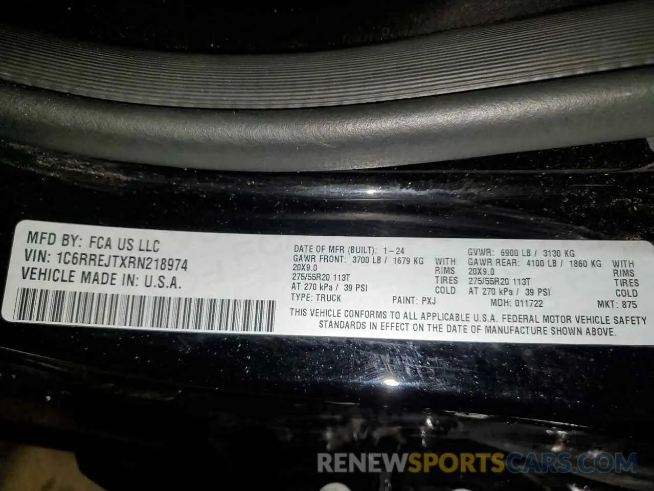 12 Photograph of a damaged car 1C6RREJTXRN218974 RAM 1500 2024
