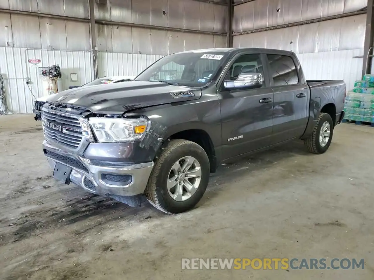 1 Photograph of a damaged car 1C6RREJTXRN220627 RAM 1500 2024