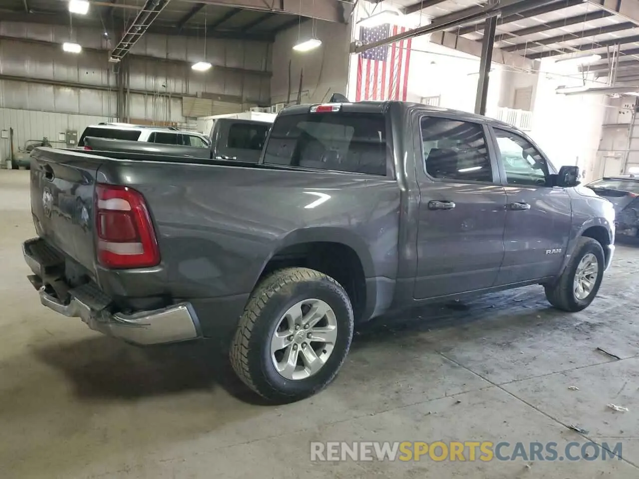 3 Photograph of a damaged car 1C6RREJTXRN220627 RAM 1500 2024