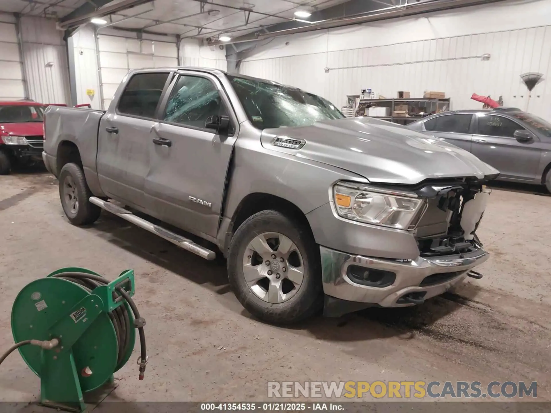 1 Photograph of a damaged car 1C6RRFFG0RN121168 RAM 1500 2024