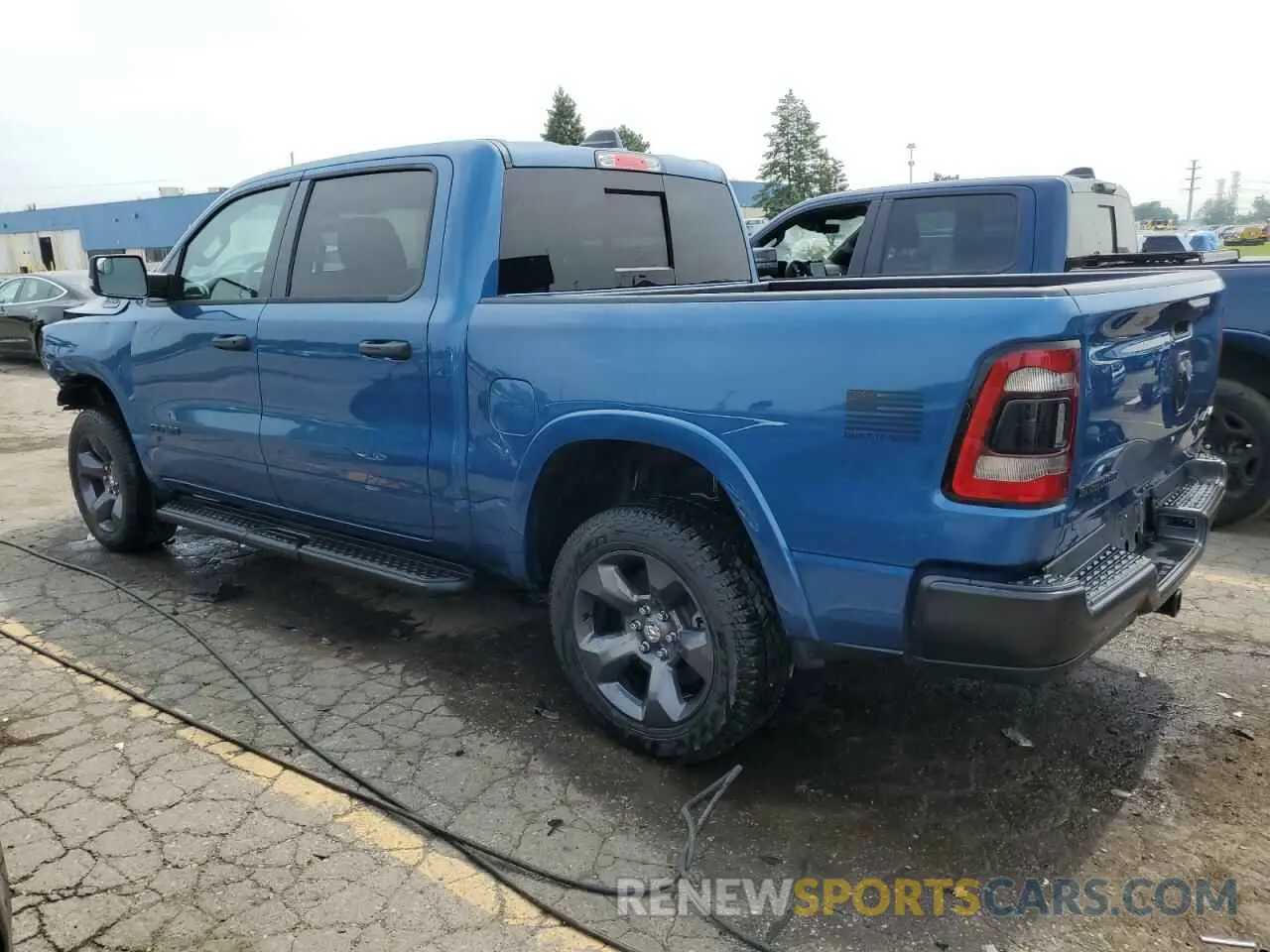 2 Photograph of a damaged car 1C6RRFFG2RN210479 RAM 1500 2024
