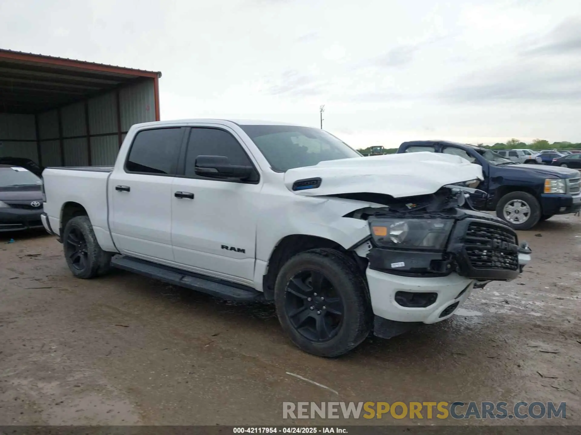 1 Photograph of a damaged car 1C6RRFFG6RN230332 RAM 1500 2024
