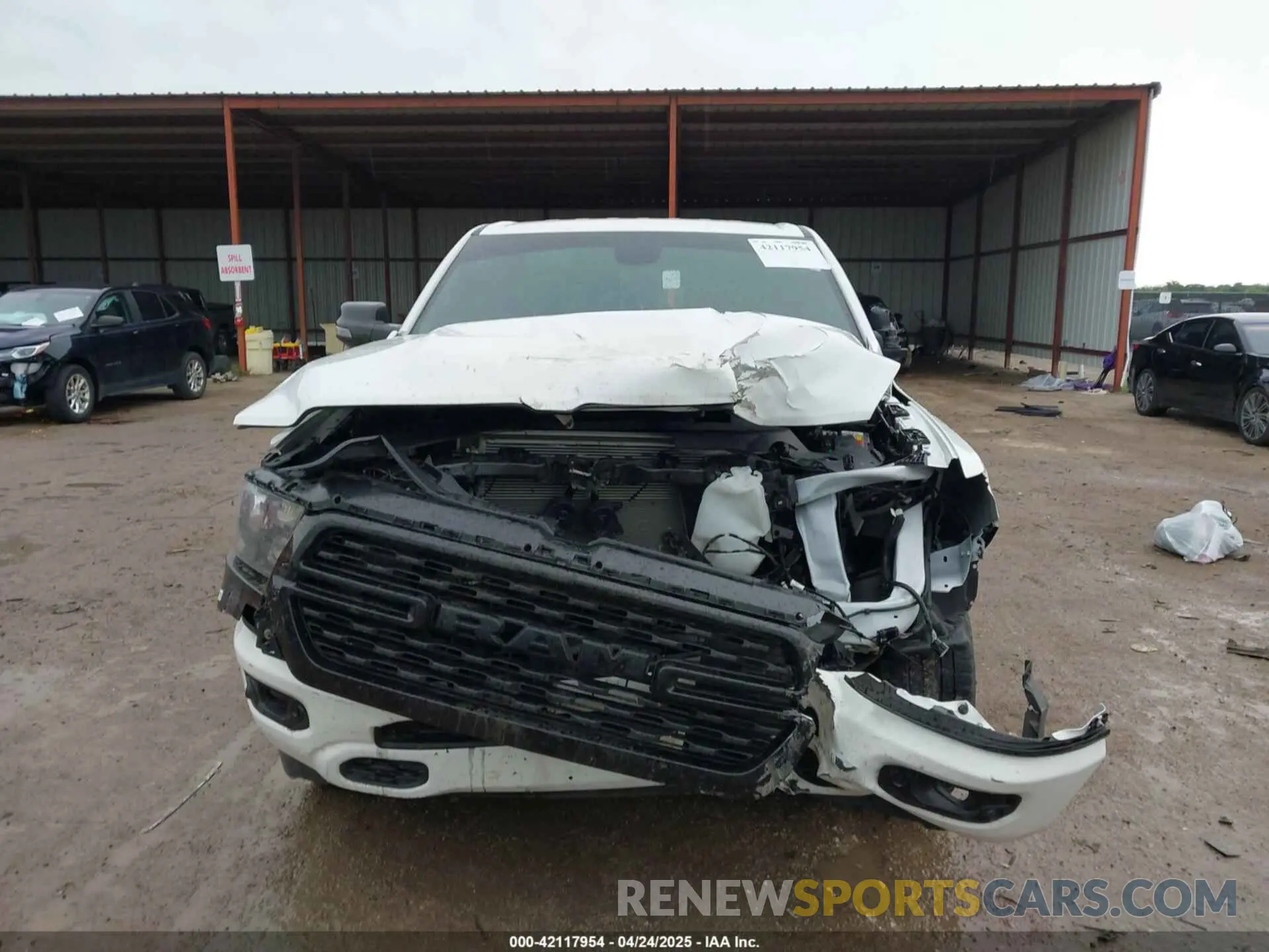 12 Photograph of a damaged car 1C6RRFFG6RN230332 RAM 1500 2024