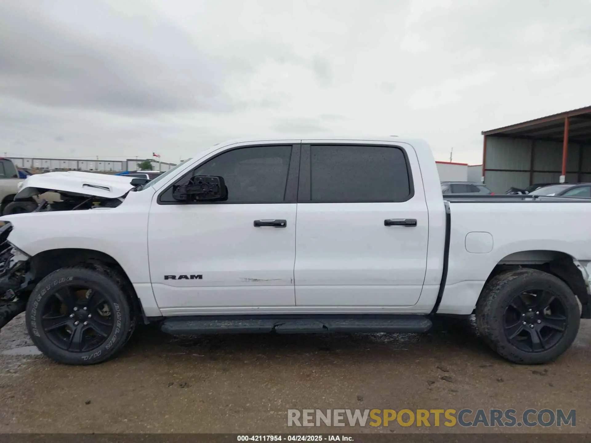 14 Photograph of a damaged car 1C6RRFFG6RN230332 RAM 1500 2024