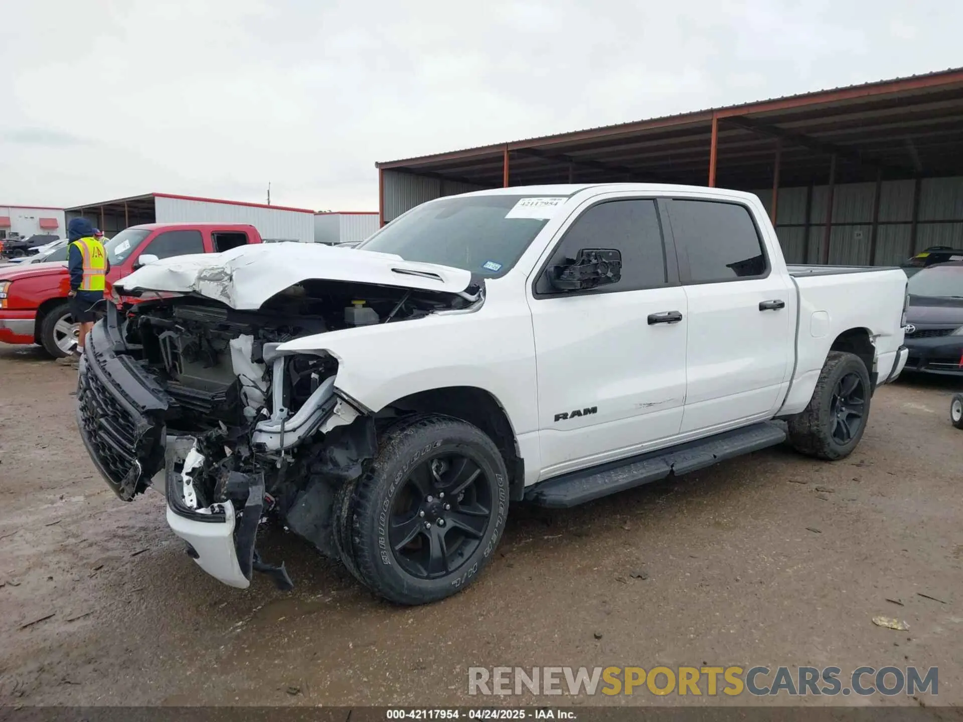 2 Photograph of a damaged car 1C6RRFFG6RN230332 RAM 1500 2024