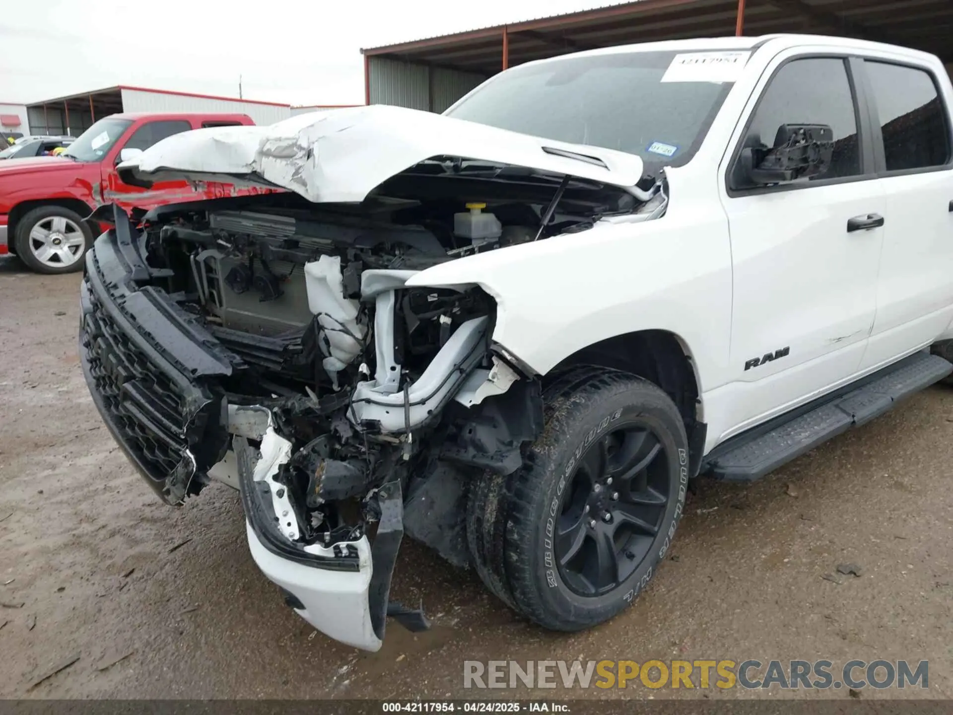 6 Photograph of a damaged car 1C6RRFFG6RN230332 RAM 1500 2024