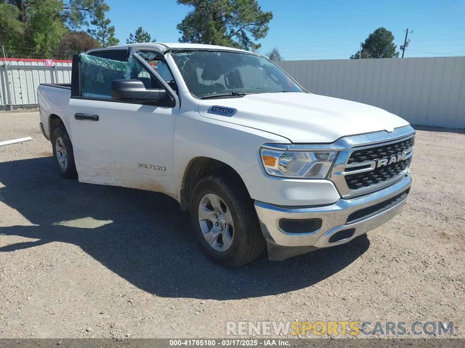 1 Photograph of a damaged car 1C6RRFFG9RN110878 RAM 1500 2024
