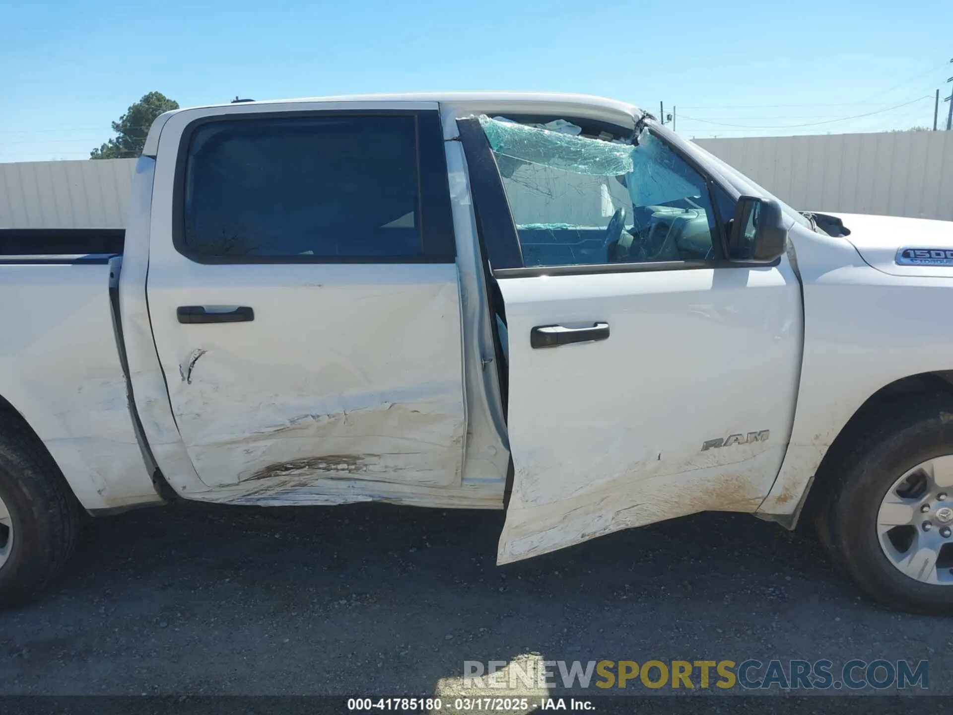 14 Photograph of a damaged car 1C6RRFFG9RN110878 RAM 1500 2024