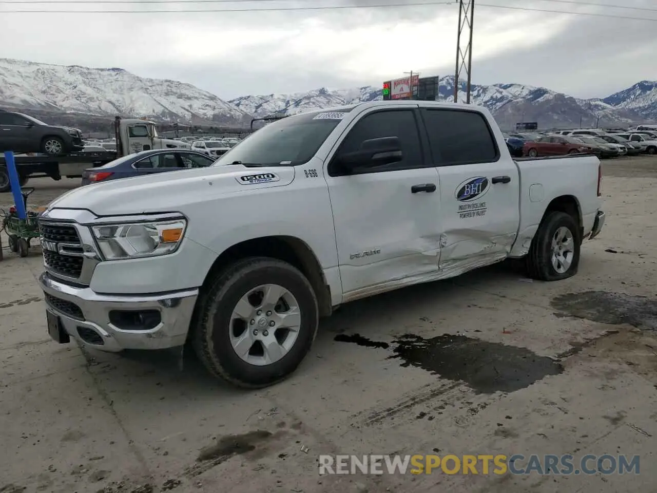 1 Photograph of a damaged car 1C6RRFFGXRN113658 RAM 1500 2024