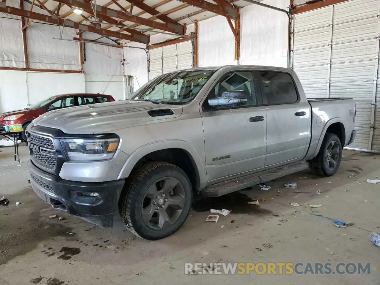 1 Photograph of a damaged car 1C6RRFFGXRN147034 RAM 1500 2024