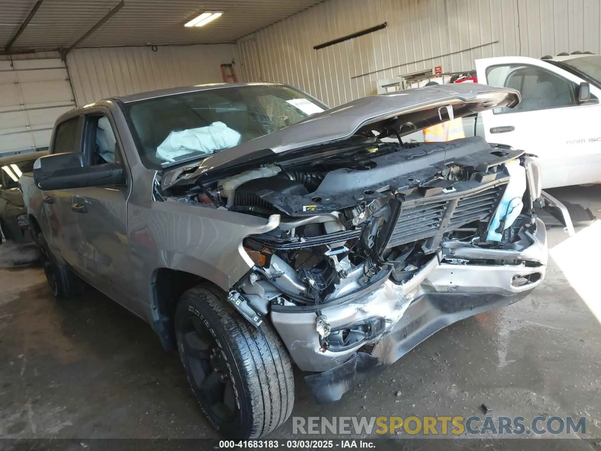 1 Photograph of a damaged car 1C6RRFGG6RN185875 RAM 1500 2024