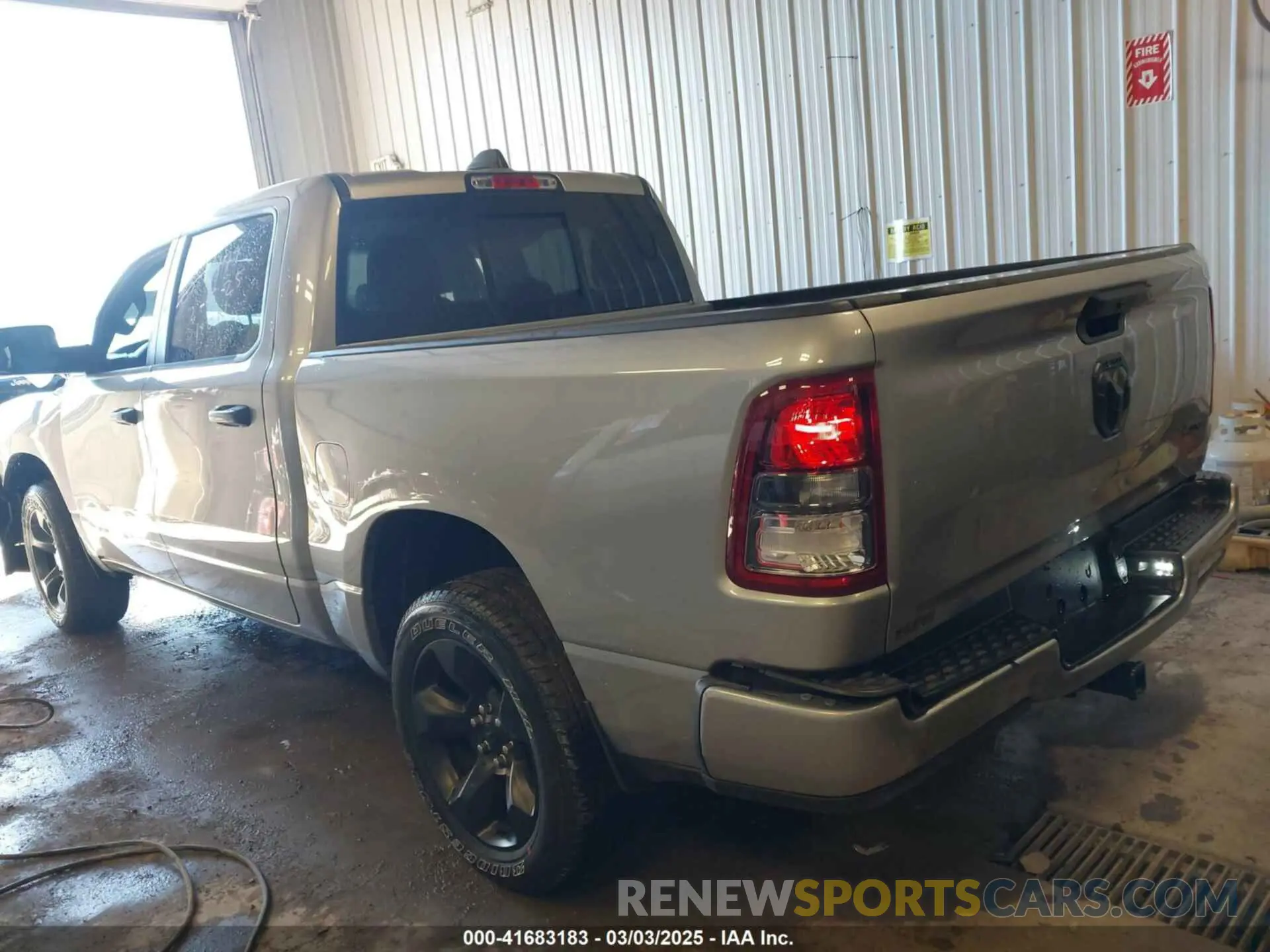 3 Photograph of a damaged car 1C6RRFGG6RN185875 RAM 1500 2024