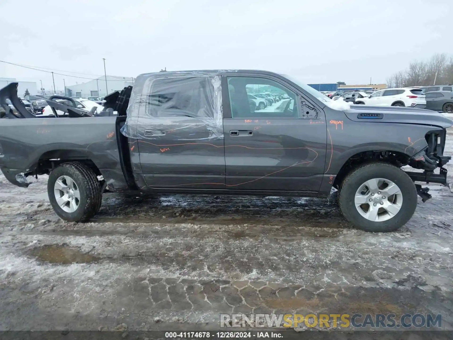 13 Photograph of a damaged car 1C6RRFGG9RN185594 RAM 1500 2024