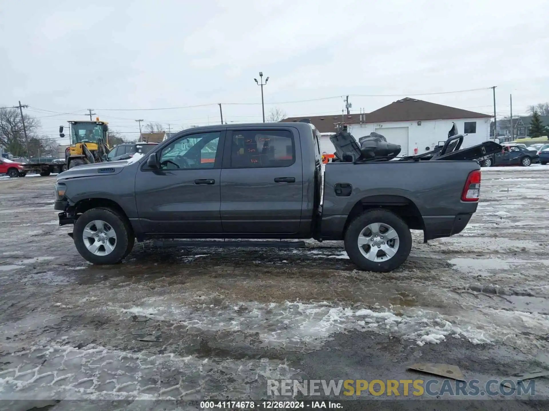 14 Photograph of a damaged car 1C6RRFGG9RN185594 RAM 1500 2024