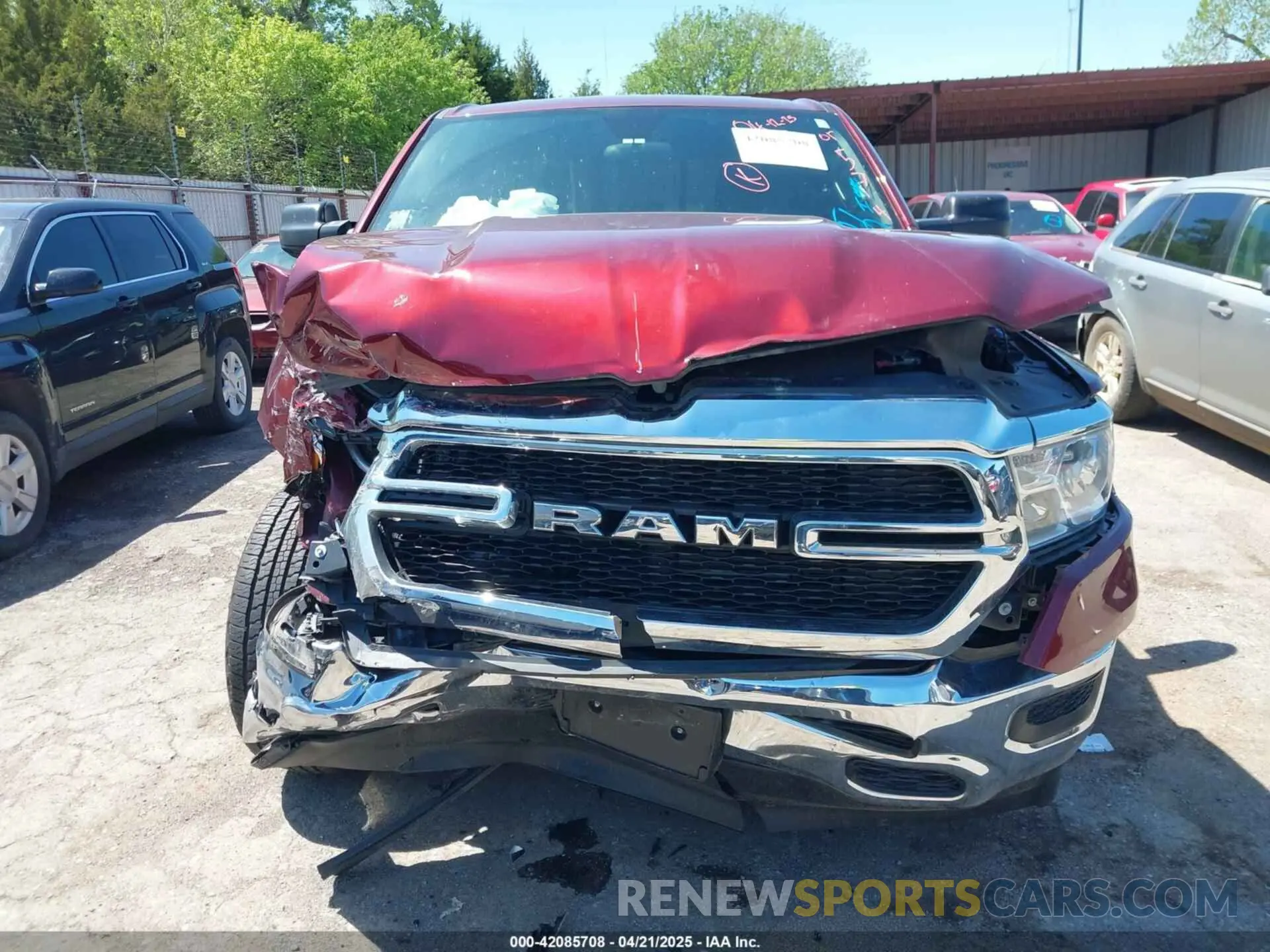 13 Photograph of a damaged car 1C6SRECG5RN205714 RAM 1500 2024