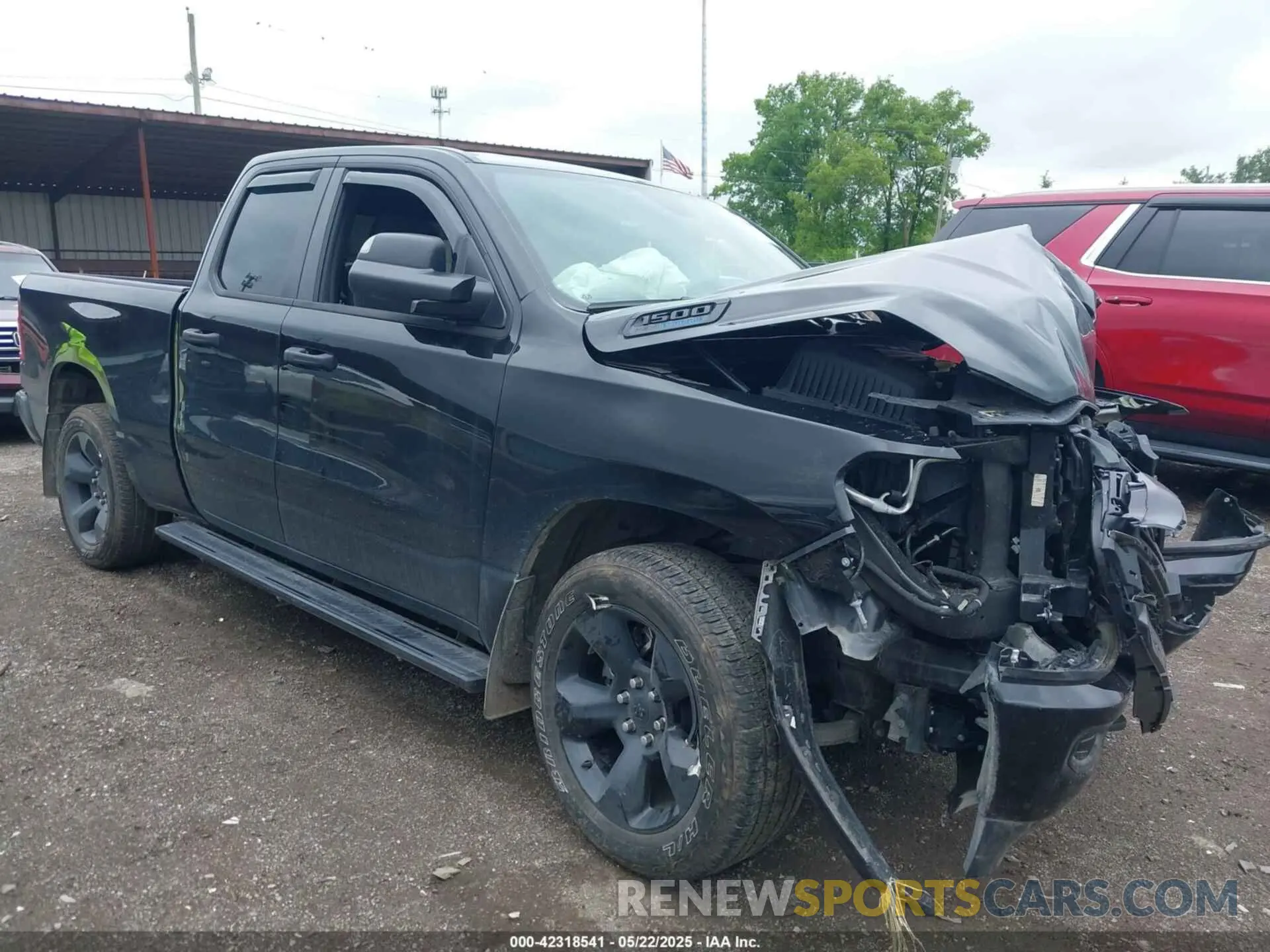 1 Photograph of a damaged car 1C6SRFCT2RN138329 RAM 1500 2024