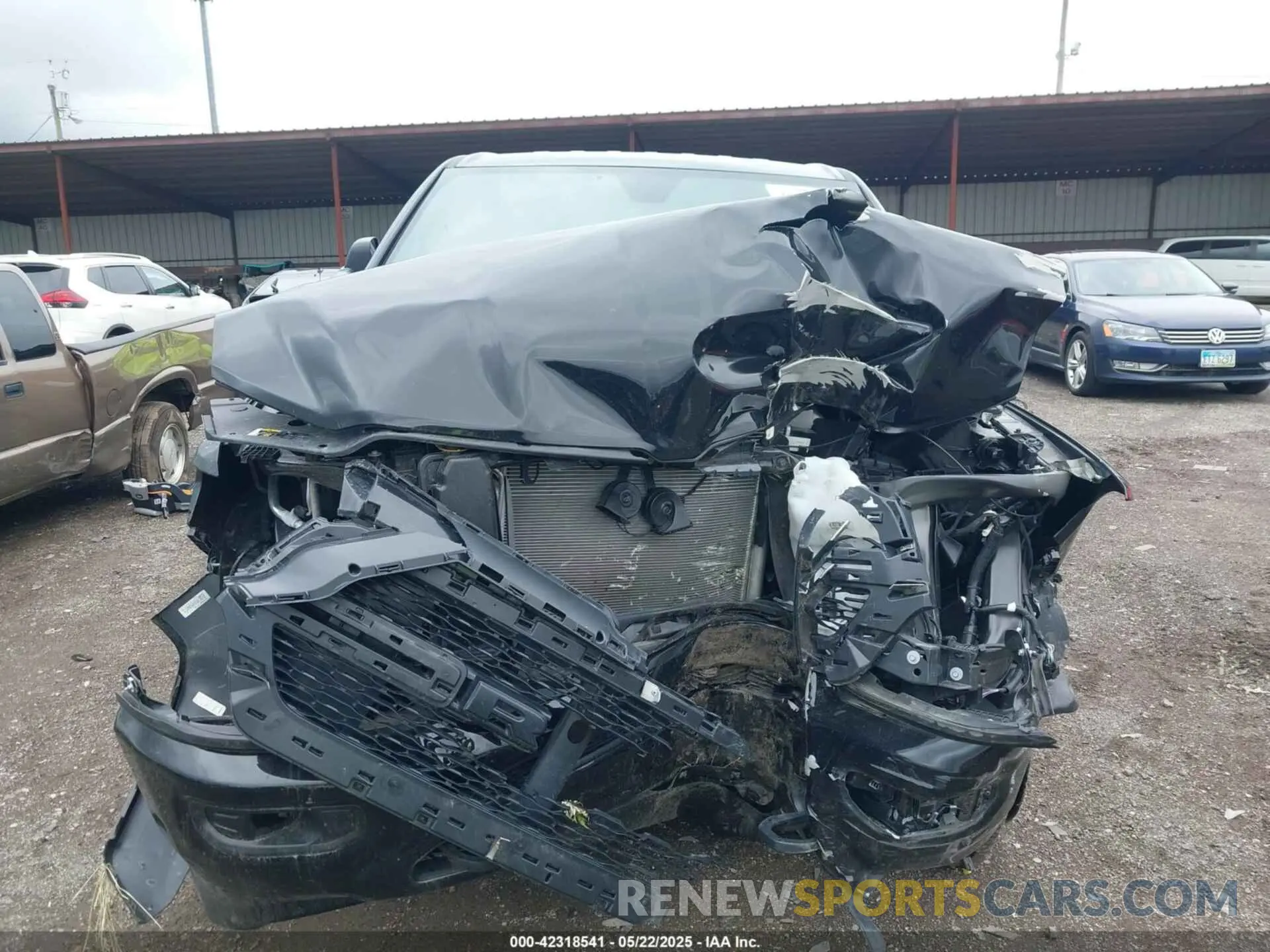 12 Photograph of a damaged car 1C6SRFCT2RN138329 RAM 1500 2024